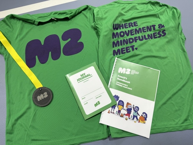 M2 T-shirts, medal, journal and coach's handbook